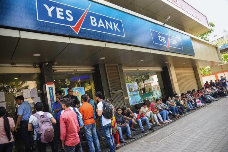 Queuing up concerned depositors outside a Yes Bank branch after knowing about the crisis. (Photo Credit: Outlook)