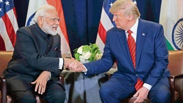 PM Narendra Modi and President Donald Trump (File Photo). Photo by Livemint.