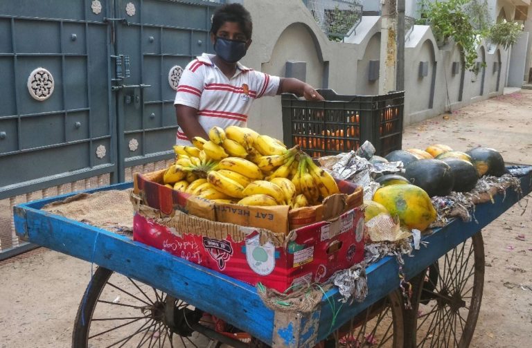 Sahib, a thirteen year old kid who is forced to sell fruits after his father, a migrant labourer became jobless. (Photo: Ariba Neyaz)