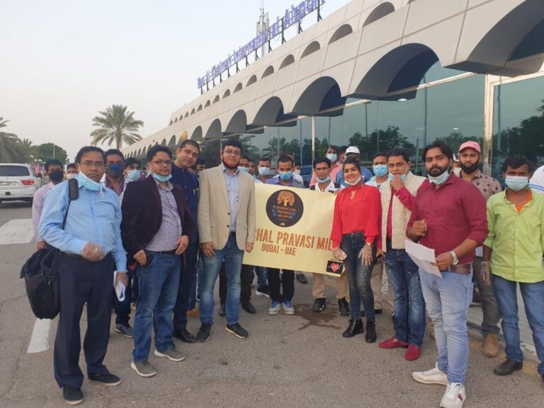 Officials of Purwanchal Pravasi Milan with home bound expats