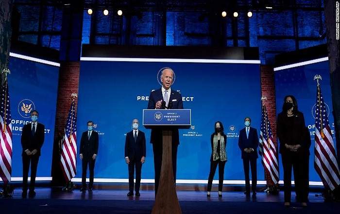 President-elect Joe Biden with some of the members of his team behind him (File Photo, Image credit: CNN.com)