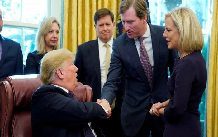 US President Donald Trump shaking hands with Chris Krebs (File Photo, Image credit: BBC.com)