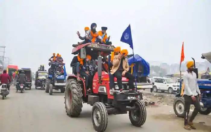 Farmers ride tractors as part of the protests against the new farm laws (File Photo, Image credit: Mint)