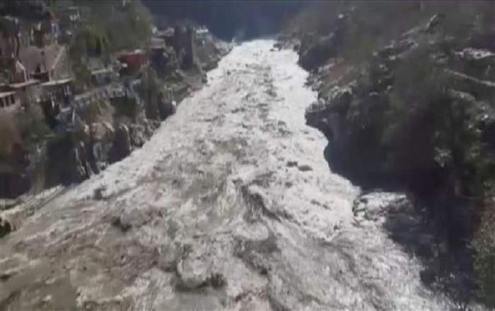 A general view of the floods caused by the river Rishiganga on February 7 in Uttarakhand (Image credit: Tribune India)
