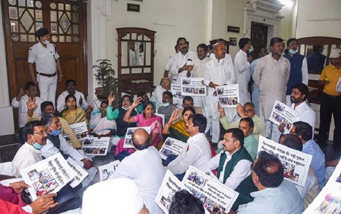RJD legislators protest outside Bihar Assembly Speaker Vijay Kumar Sinha's chamber on Tuesday (Image credit: NDTV)