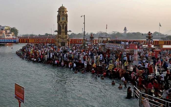 Pilgrims take holy dip in the Ganga on the occasion of Somvati Amavasya in Haridwar on Monday (Image credit: Reuters)