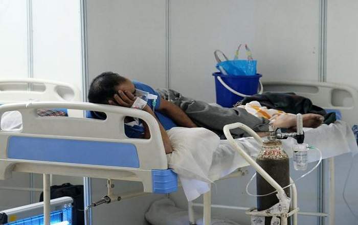 File photo of a patient breathing through oxygen support (Image credit: Business Standard)
