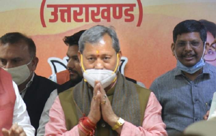 Uttarakhand chief minister Tirath Singh Rawat (C) (Image credit: The New Indian Express)